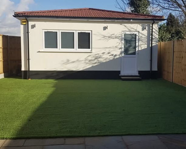 Garden and outbuilding after refurbishment